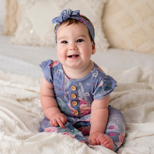 Bums & Roses - Baby & Kids Bamboo Pajamas - Somebuddy to Love Ruffle Romper - Image 1